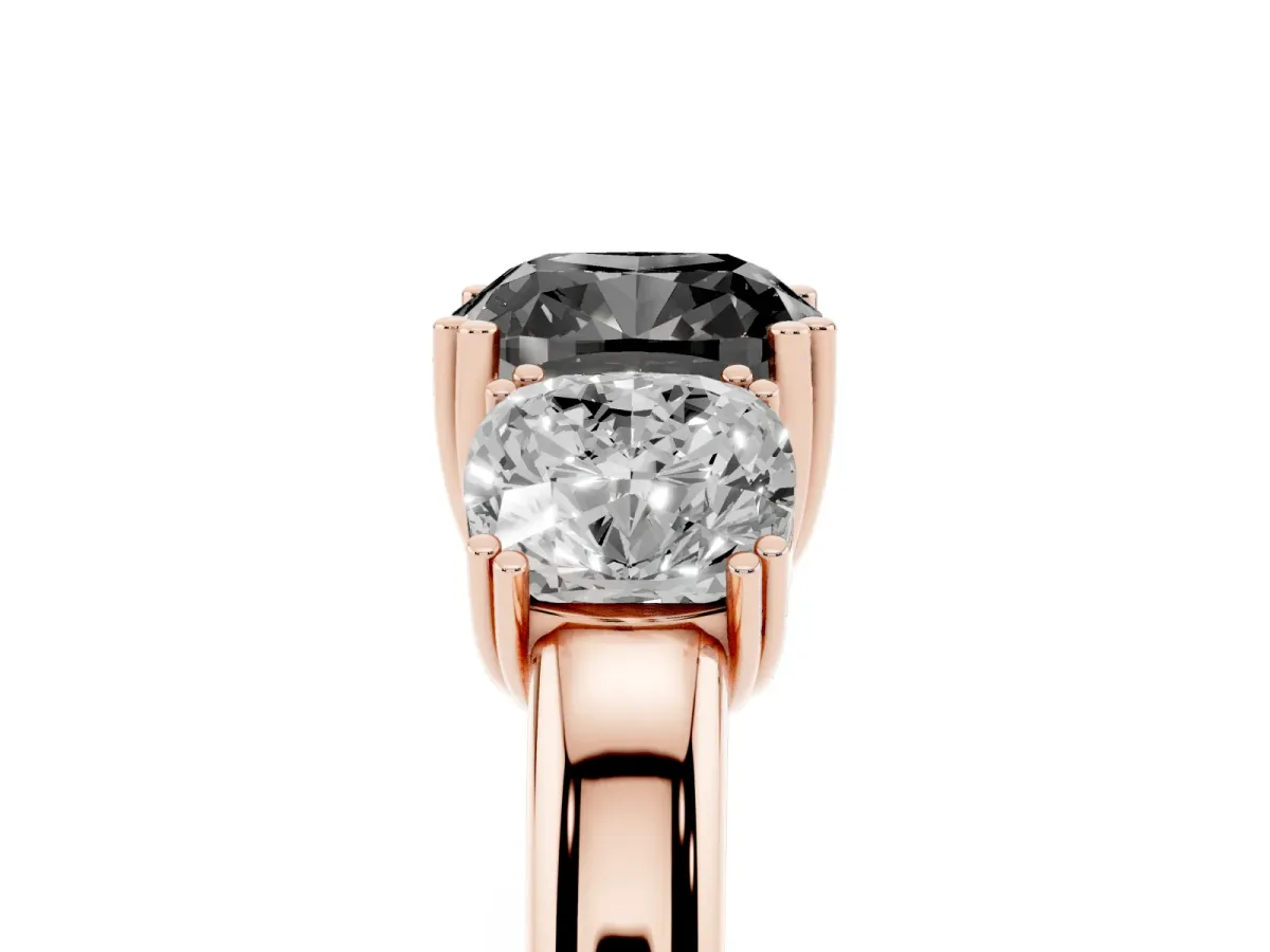 Fancy Black Three-Stone Cushion Cut Cut Diamond Ring with Channel Set Band and Four-Prong Setting Rose gold