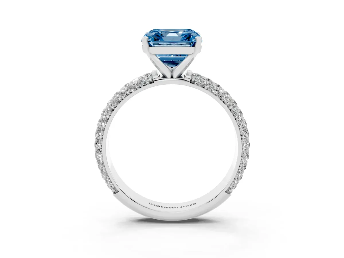 Fancy Blue Asscher Cut Diamond Solitaire Ring with Prong Setting and Pavé Band Platinum