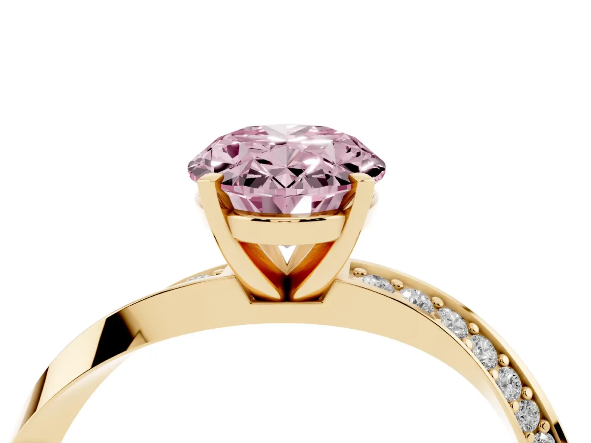 Fancy Pink Oval Cut Diamond Engagement Ring with Side Stone Accents and Four-Prong Setting Yellow gold