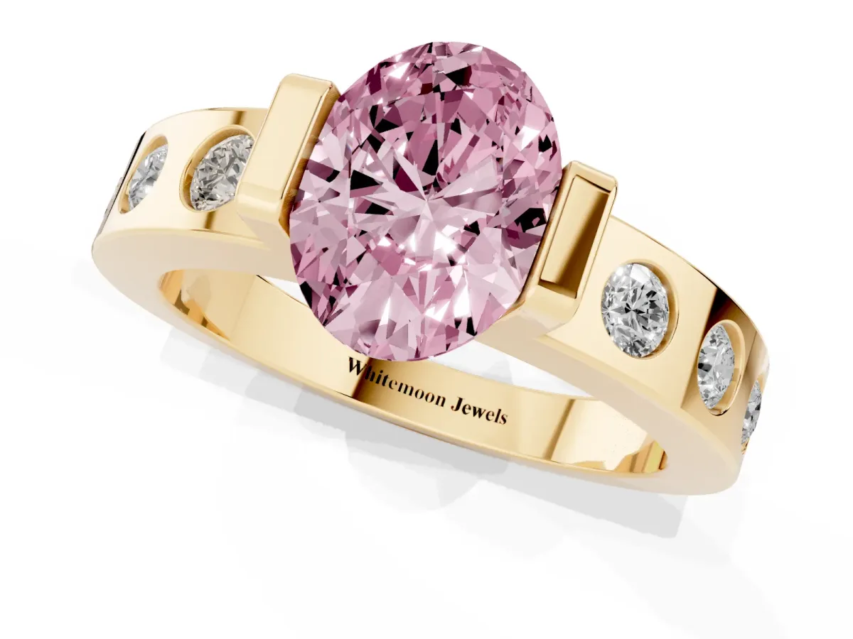 Fancy Pink Oval Cut Brilliant Channel-Set Diamond Ring with Bezel Prong Setting Yellow gold