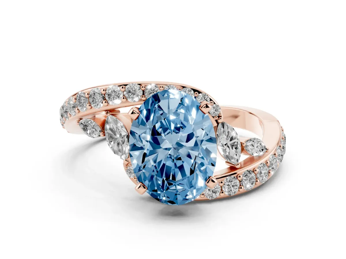 Fancy Blue Oval Cut Solitaire with Pavé Twist Band and Four-Prong Setting Rose gold
