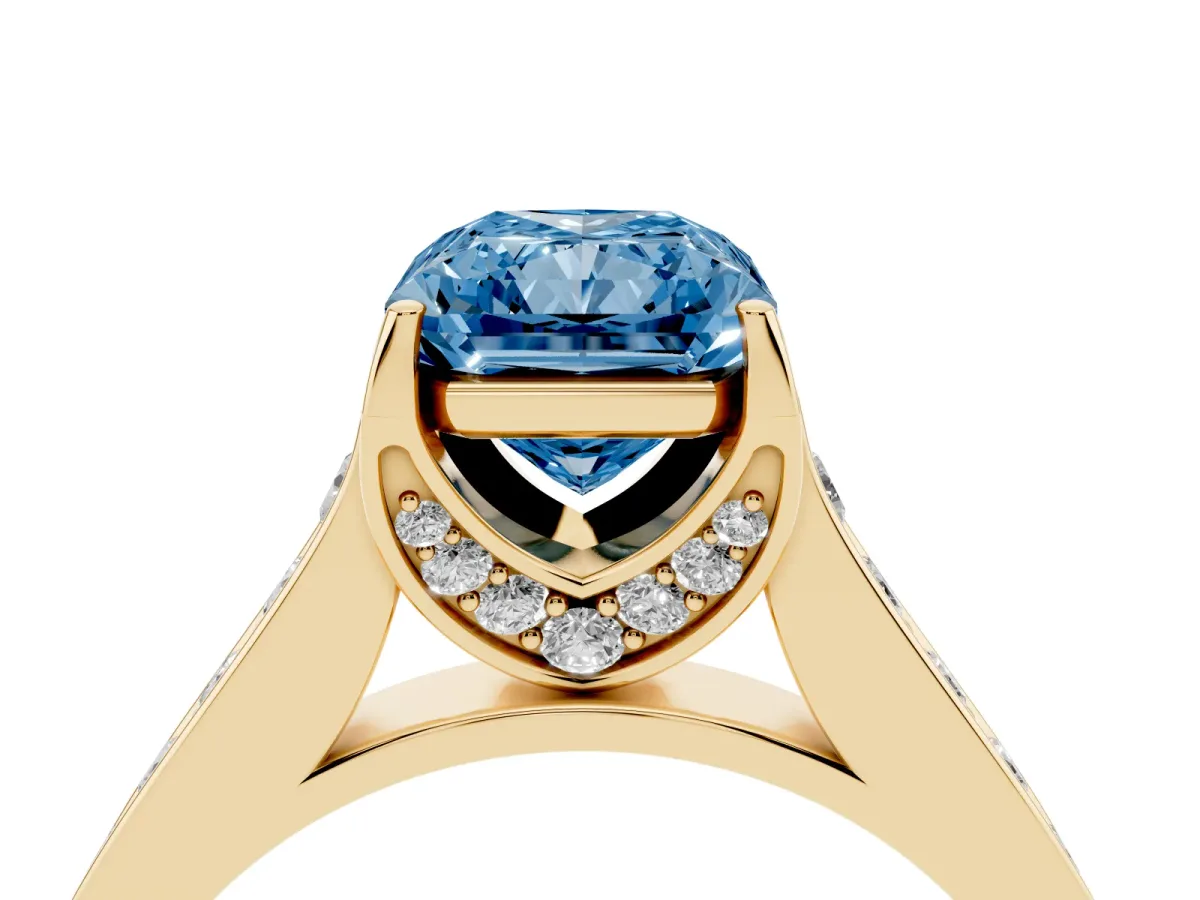 Fancy Blue Radiant Cut Brilliant Cut Diamond Engagement Ring with Pavé Band and Four-Prong Setting Yellow gold