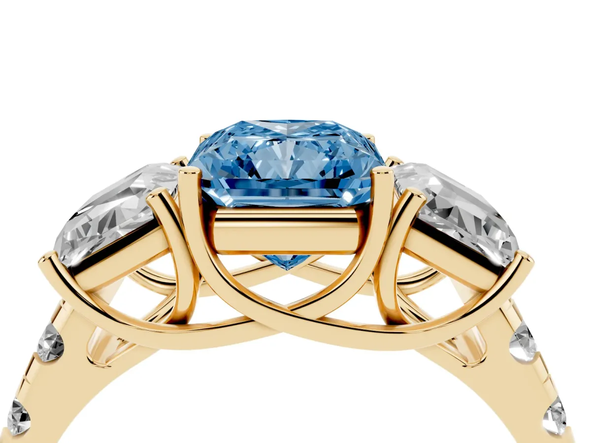 Fancy Blue Three-Stone Radiant Cut Diamond Pavé Band with Prong Setting Yellow gold