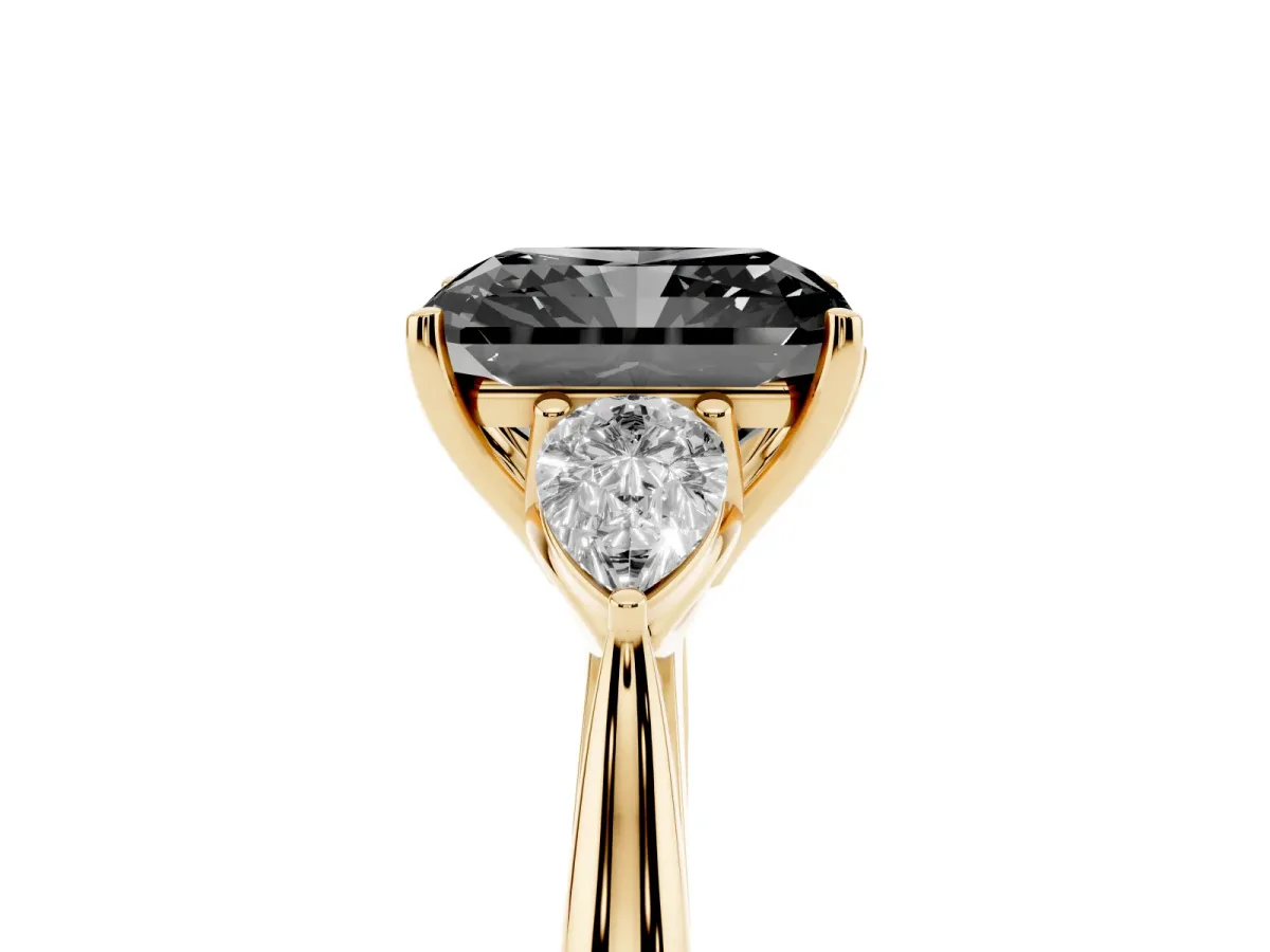 Fancy Black Three-Stone Radiant Cut Brilliant Diamond Solitaire Ring with Tapered Band and Four-Prong Setting Yellow gold
