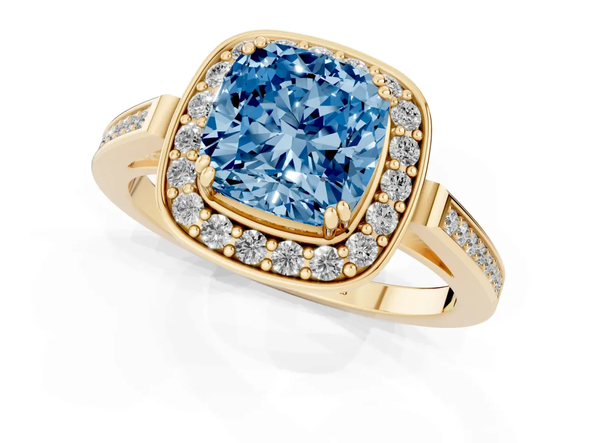 Fancy Blue Cushion Cut Diamond Halo Ring with Split Shank and Four-Prong Setting Yellow gold