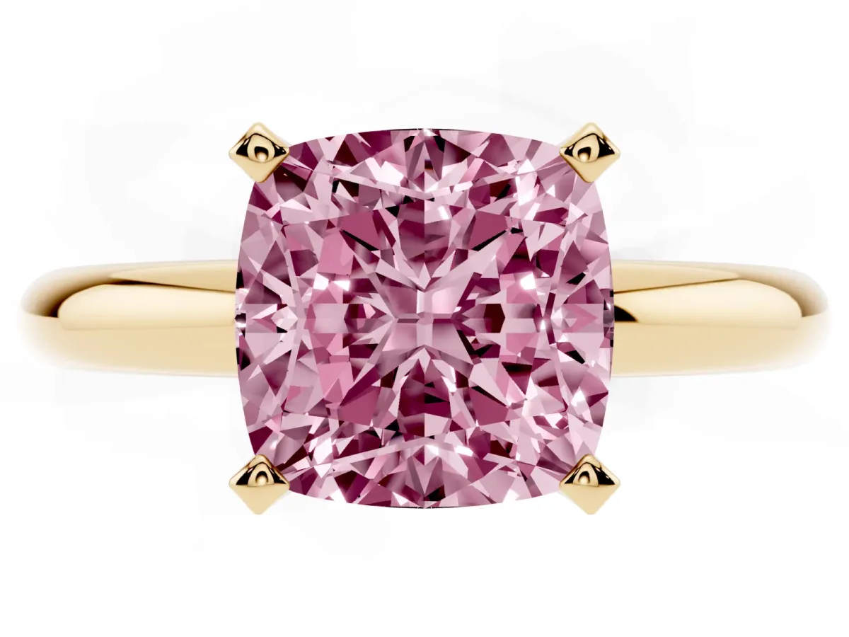 Fancy Pink Cushion Cut Diamond Solitaire Engagement Ring with Round Band and Four-Prong Setting Yellow gold