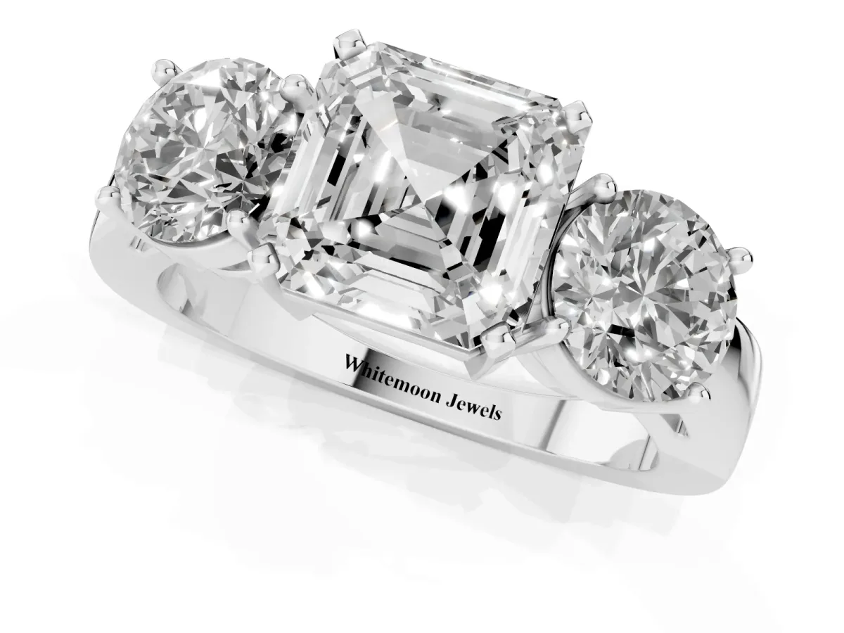 Three-Stone Asscher Cut Diamond Ring with Round Side Stones, Classic Band, and Four-Prong Setting Silver