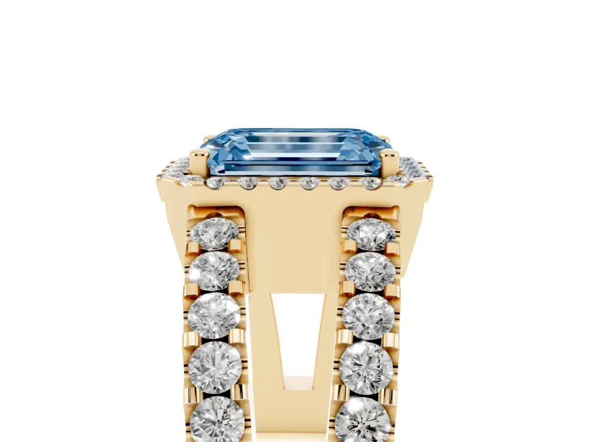 Fancy Blue Emerald Cut Cut Halo Split Shank Diamond Ring with Four-Prong Setting Yellow gold