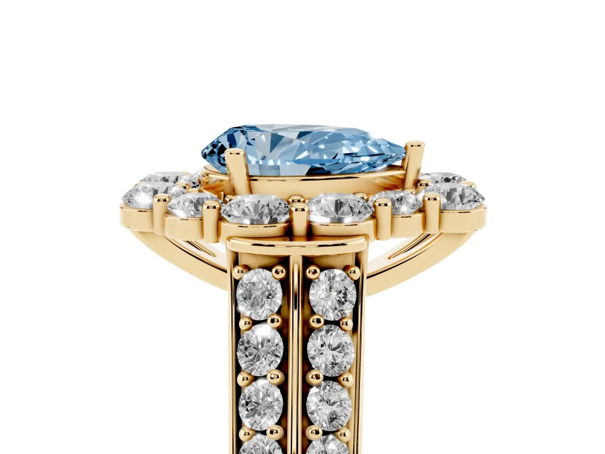 Fancy Blue Pear Cut Halo Diamond Engagement Ring with Split Shank and Prong Setting Yellow gold