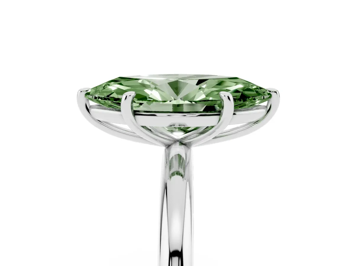 Fancy Green Oval Cut Solitaire Diamond Ring with Four-Prong Setting on a Plain Band Silver