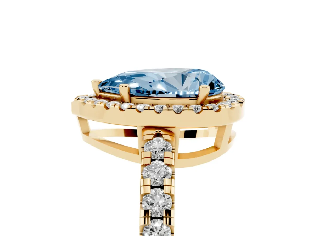 Fancy Blue Pear Cut Diamond Halo Ring with Pavé Band and Four-Prong Setting Yellow gold