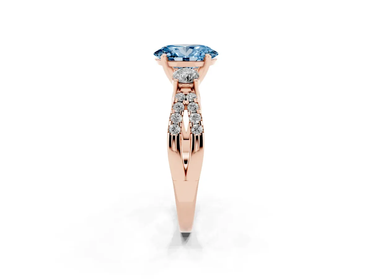 Fancy Blue Oval Cut Diamond Three-Stone Ring with Pavé Split Shank and Four-Prong Setting Rose gold