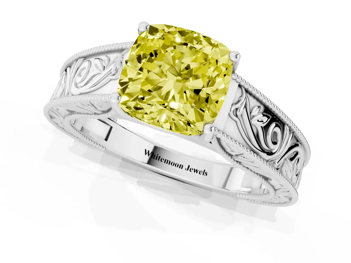 Fancy Yellow Cushion Cut Diamond Solitaire Ring with Engraved Band and Four-Prong Setting Silver