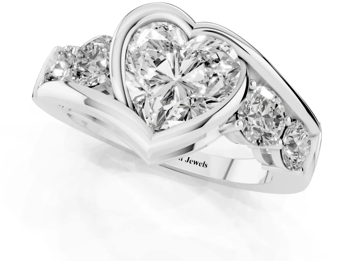 Bezel Set Heart Cut Diamond Bypass Ring with Round Accents Platinum
