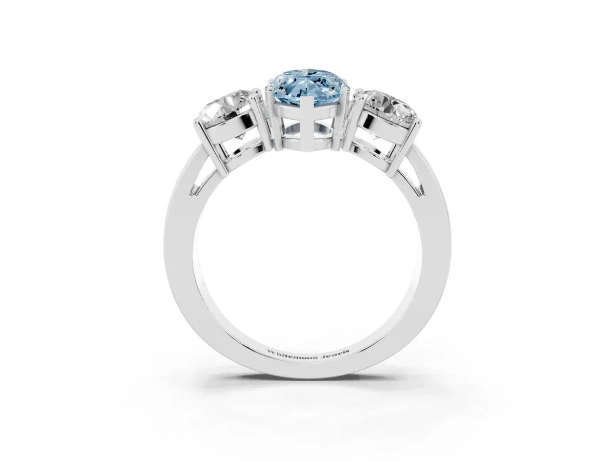 Fancy Blue Three-Stone Marquise Cut Diamond Ring with Round Side Stones, Classic Band, and Four-Prong Setting Platinum