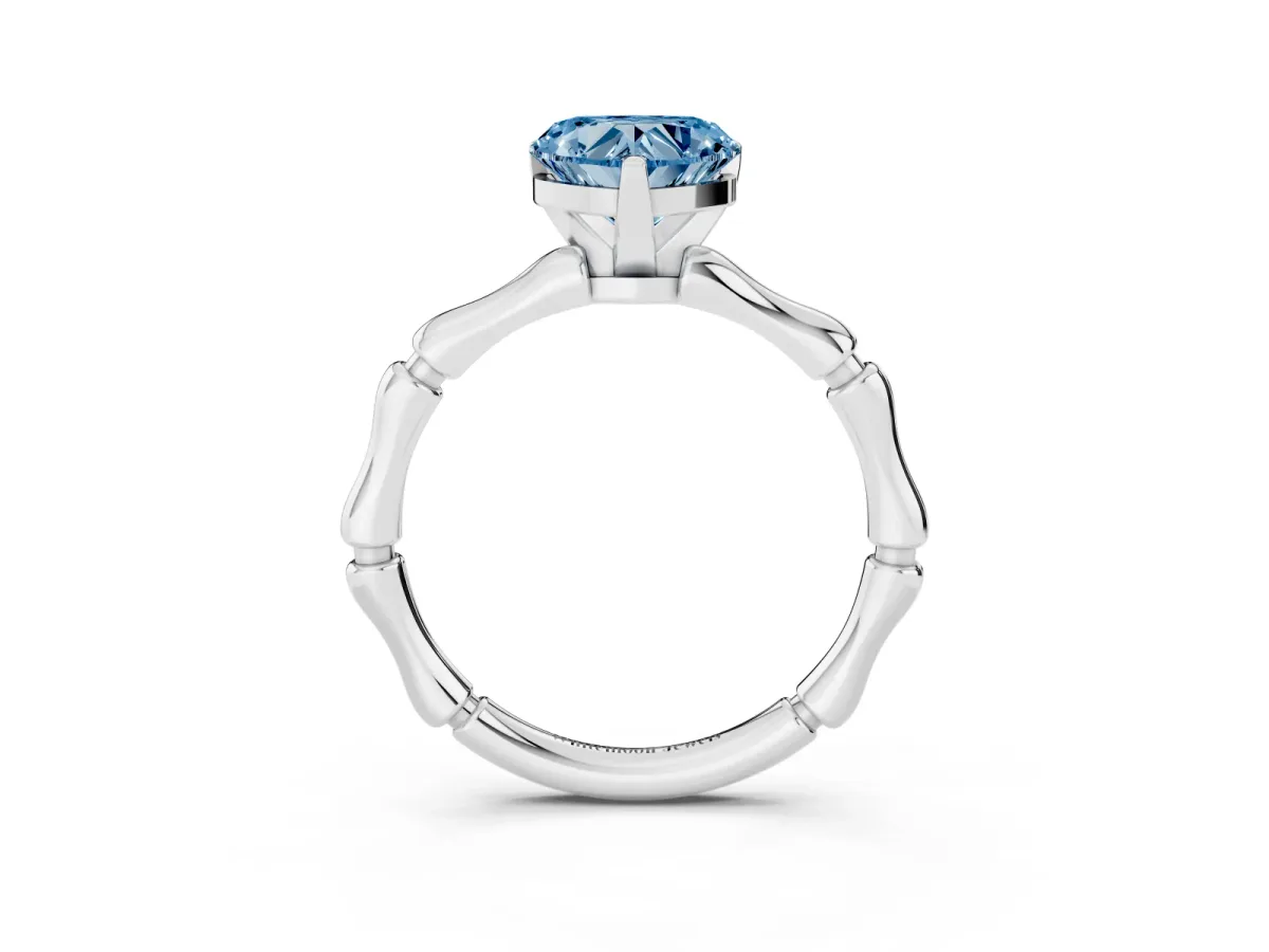 Fancy Blue Heart Cut Solitaire Diamond Ring with Bamboo Band and Four-Prong Setting Silver
