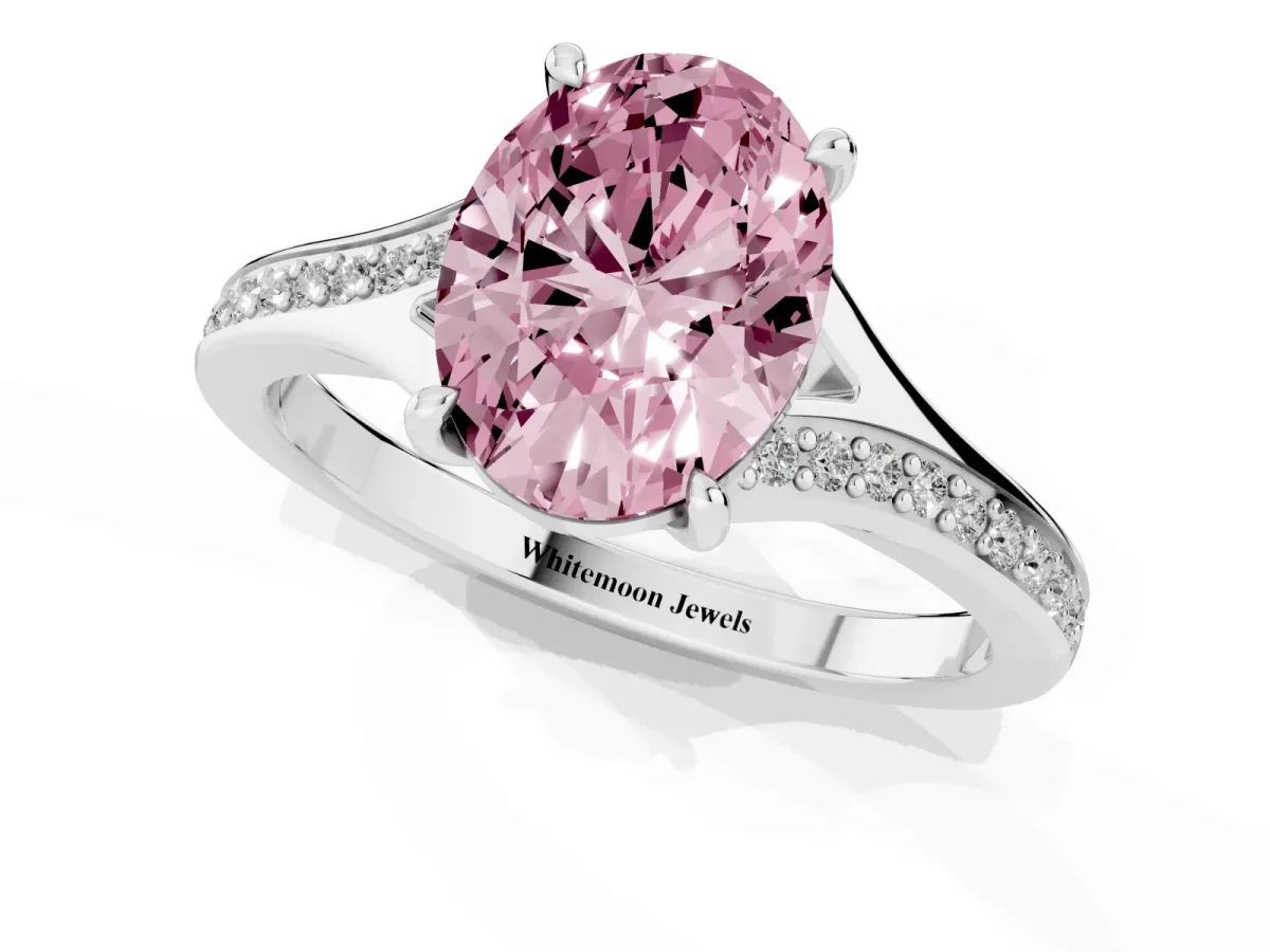 Fancy Pink Oval Cut Diamond Solitaire Ring with Pavé Band and Prong Setting Silver