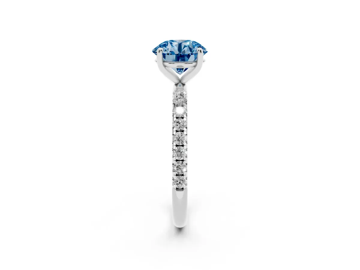 Fancy Blue Round Cut Cut Diamond Solitaire Ring with Micro Pave Band and Four Prong Setting Platinum