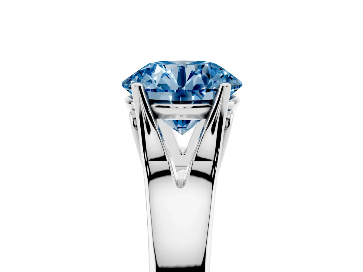 Fancy Blue Round Cut Solitaire Diamond Ring with Cathedral Band and Four-Prong Setting Silver