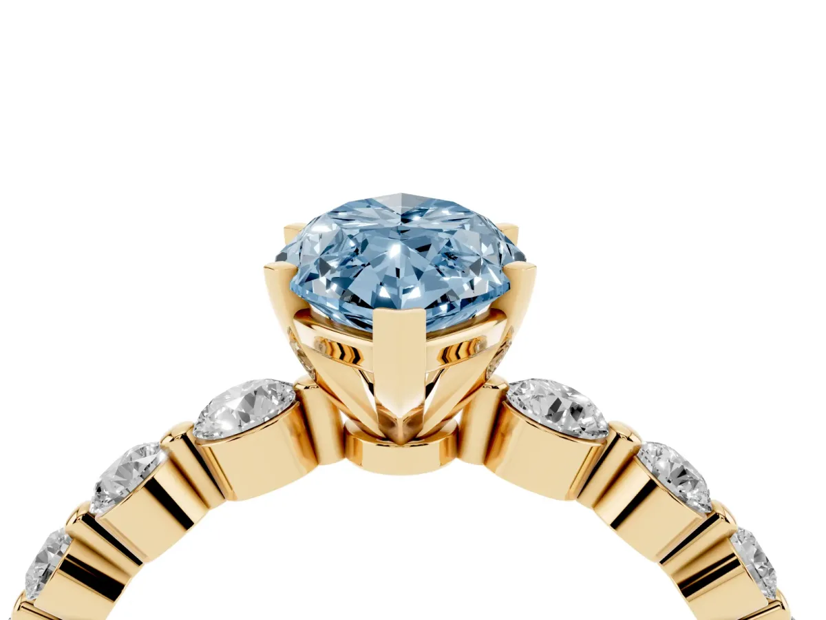 Fancy Blue Marquise Cut Solitaire Diamond Ring with Pave Band and Four-Prong Setting Yellow gold