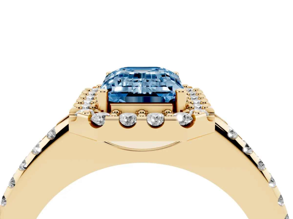 Fancy Blue Emerald Cut Diamond Pavé Halo Ring with Four-Prong Setting Yellow gold