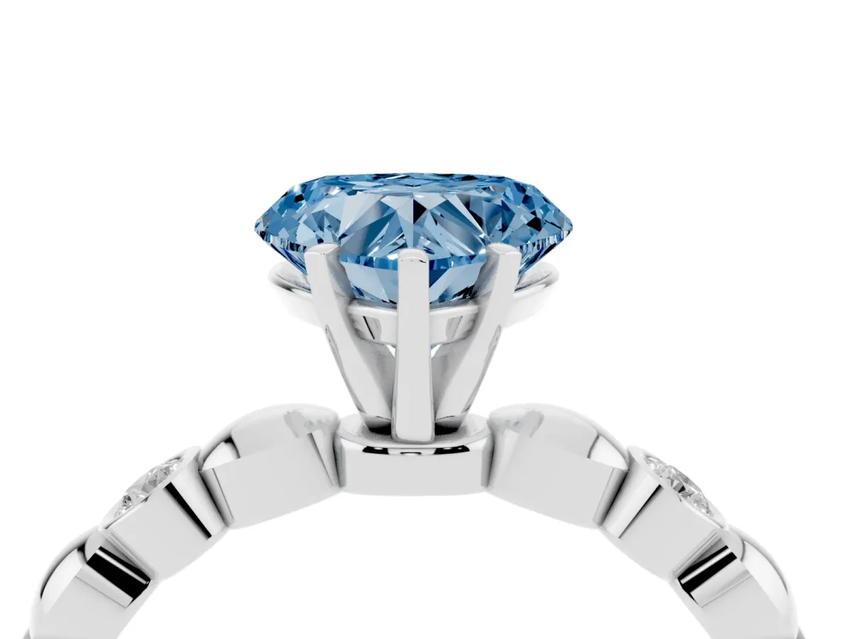 Fancy Blue Heart Cut Solitaire Bezel-Set Diamond Ring with Beaded Band and Four-Prong Setting Silver