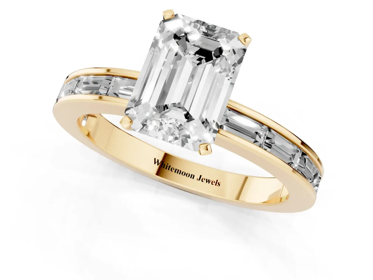 Emerald Cut Solitaire Diamond Ring with Channel-Set Baguette Band and Four-Prong Setting Yellow gold