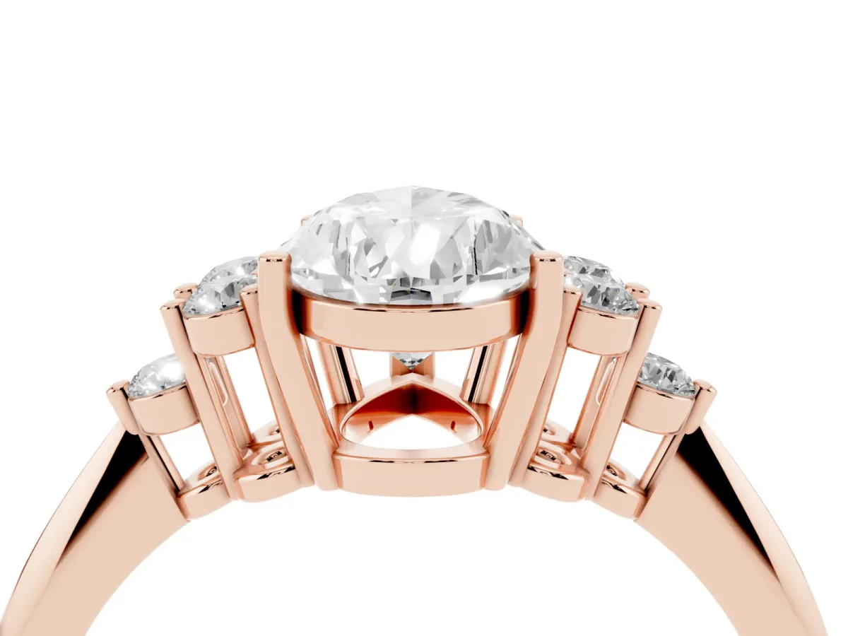 Pear Cut Cut Diamond Cluster Ring with Solitaire Band and Four-Prong Setting Rose gold