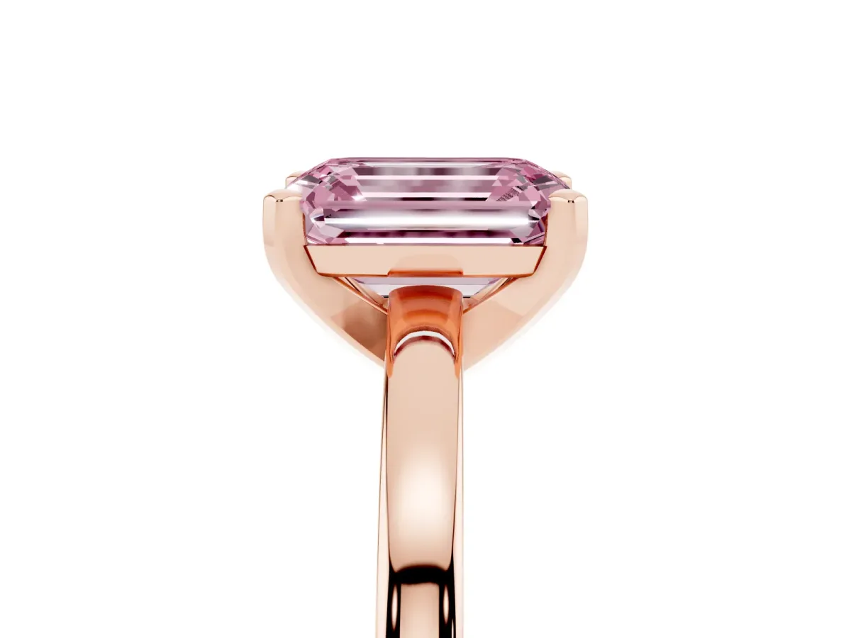 Fancy Pink Emerald Cut Solitaire Diamond Engagement Ring with Four-Prong Setting on a Classic Band Rose gold