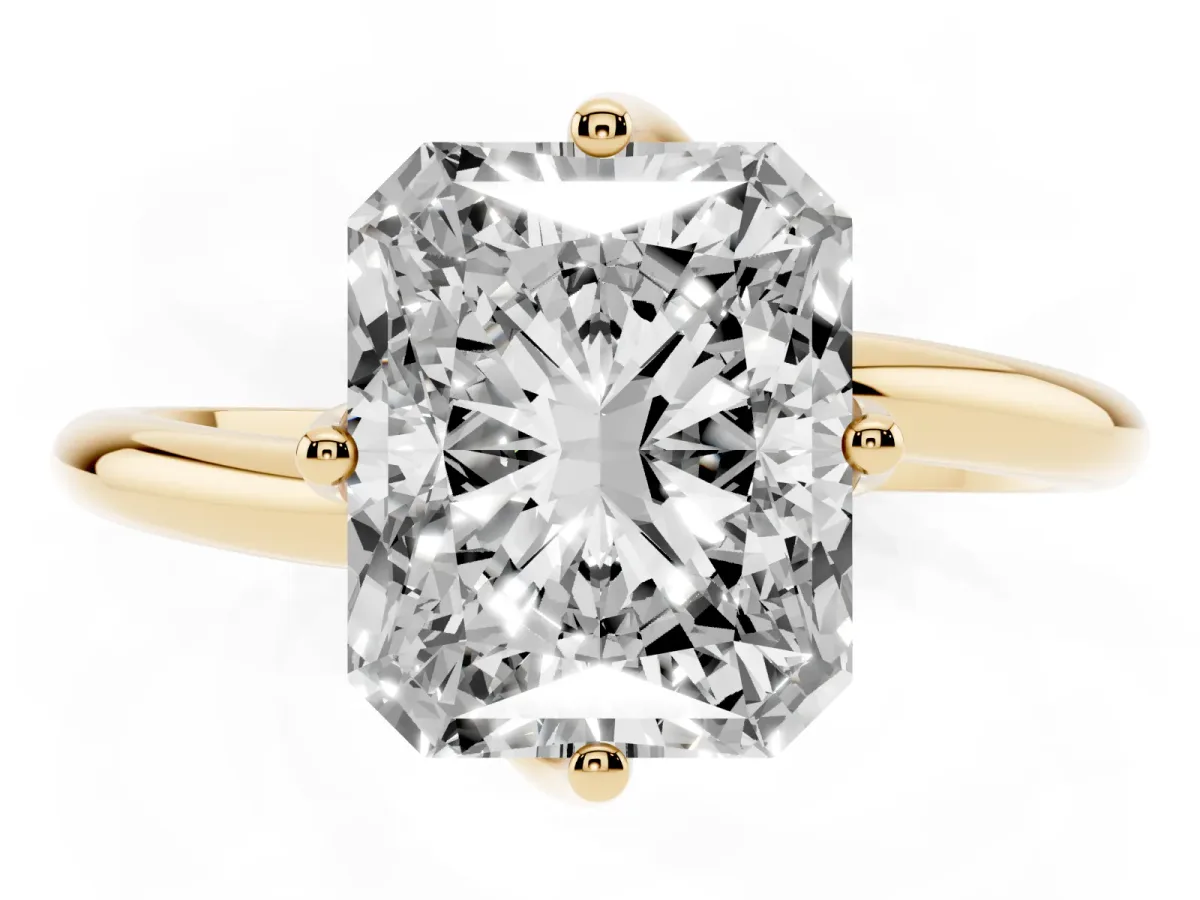 Radiant Cut Diamond Solitaire Engagement Ring with Four-Prong Setting and Classic Band Yellow gold