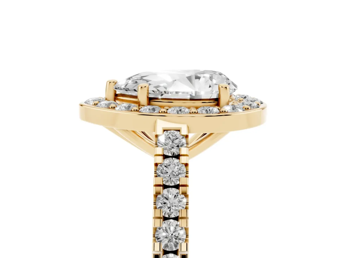 Pear Cut Diamond Halo Ring with Round Pavé Split Shank and Prong Setting Yellow gold