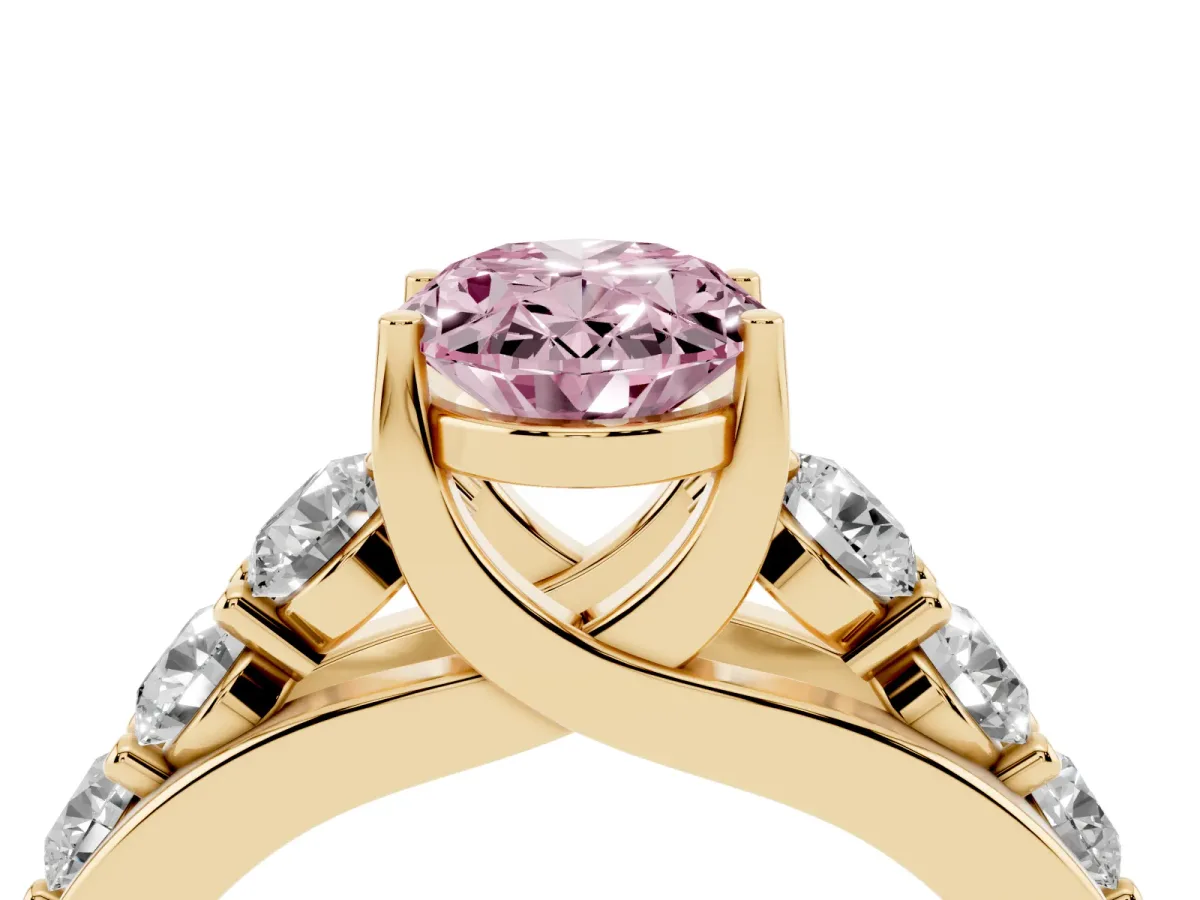 Fancy Pink Oval Cut Diamond Engagement Ring with Pavé Band and Four-Prong Setting Yellow gold