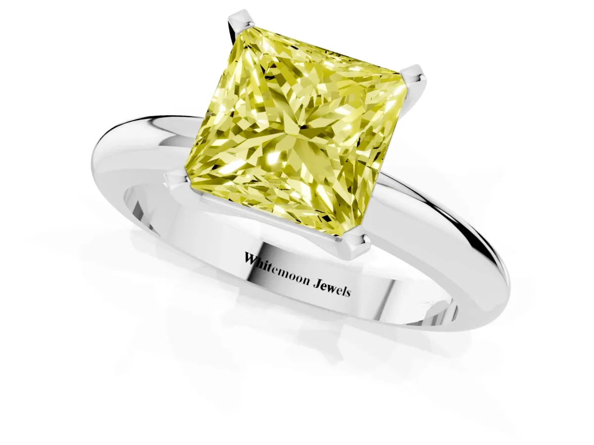 Fancy Yellow Princess Cut Diamond Solitaire Engagement Ring with Round Band and Four-Prong Setting Platinum