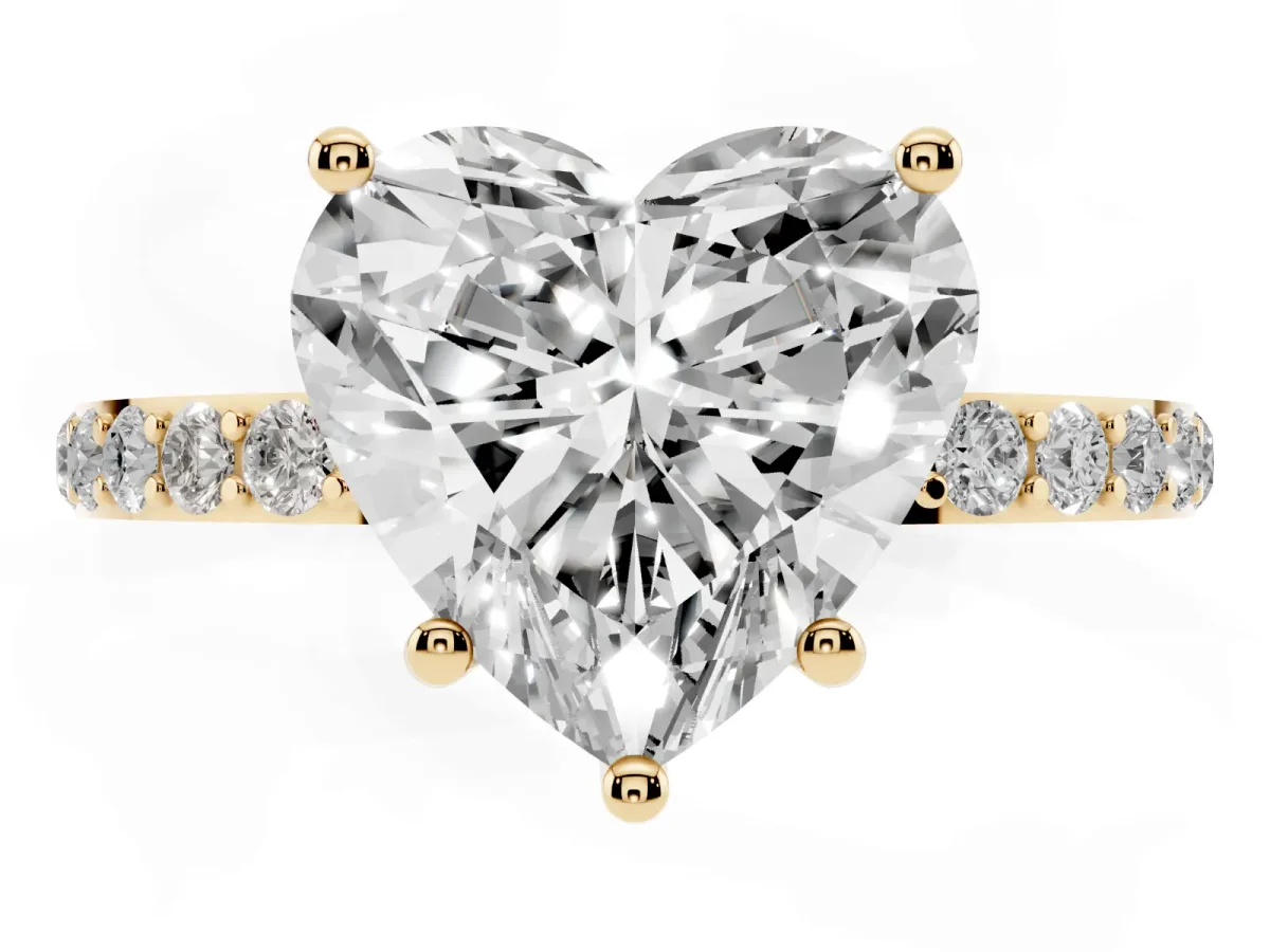 Heart Cut Diamond Solitaire Ring with Round Pavé Shoulders and Prong Setting Yellow gold