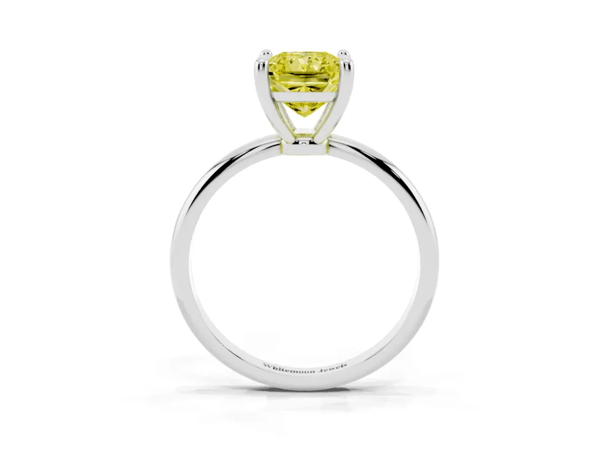 Fancy Yellow Radiant Cut Solitaire Diamond Ring with 4-Prong Setting on a Classic Band Platinum