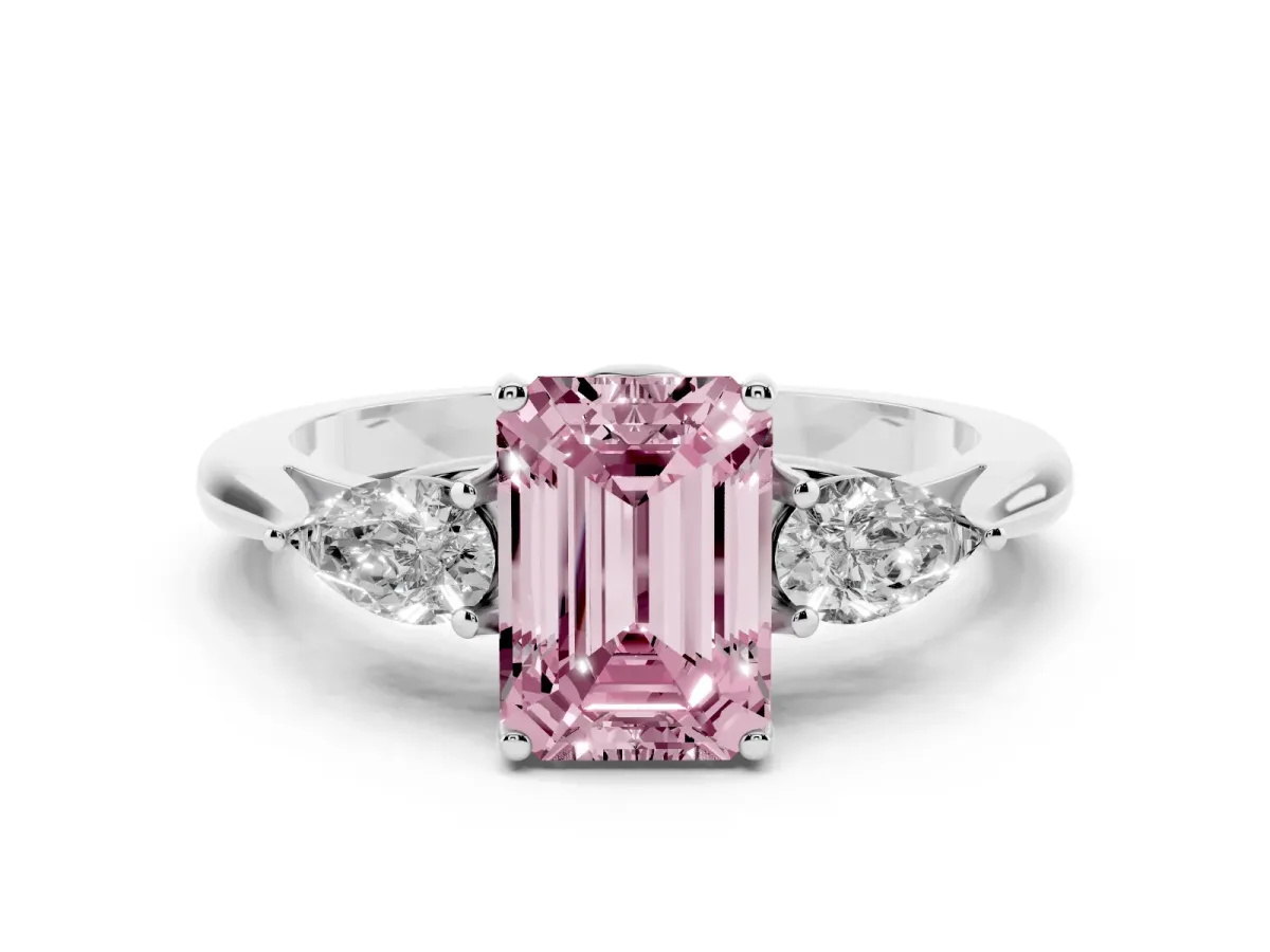 Fancy Pink Three-Stone Emerald Cut Diamond Ring with Pear Side Stones in Four-Prong Setting Platinum