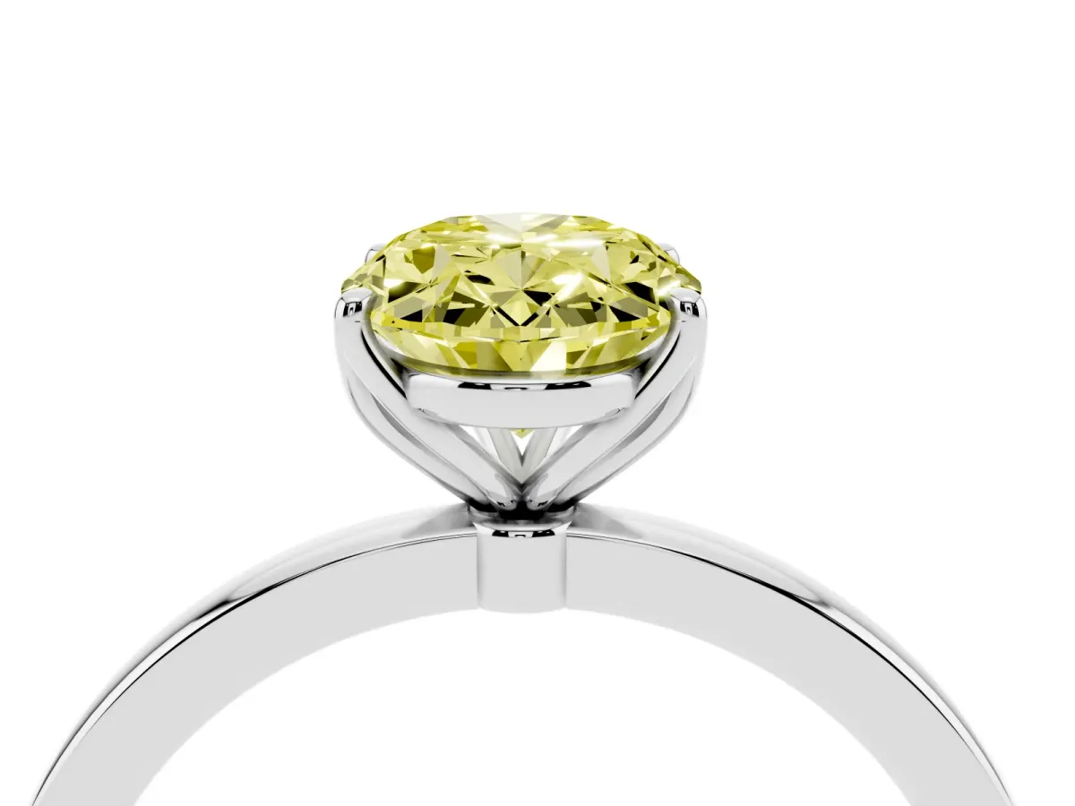 Fancy Yellow Oval Cut Diamond Solitaire Ring with Thin Band and Prong Setting Silver