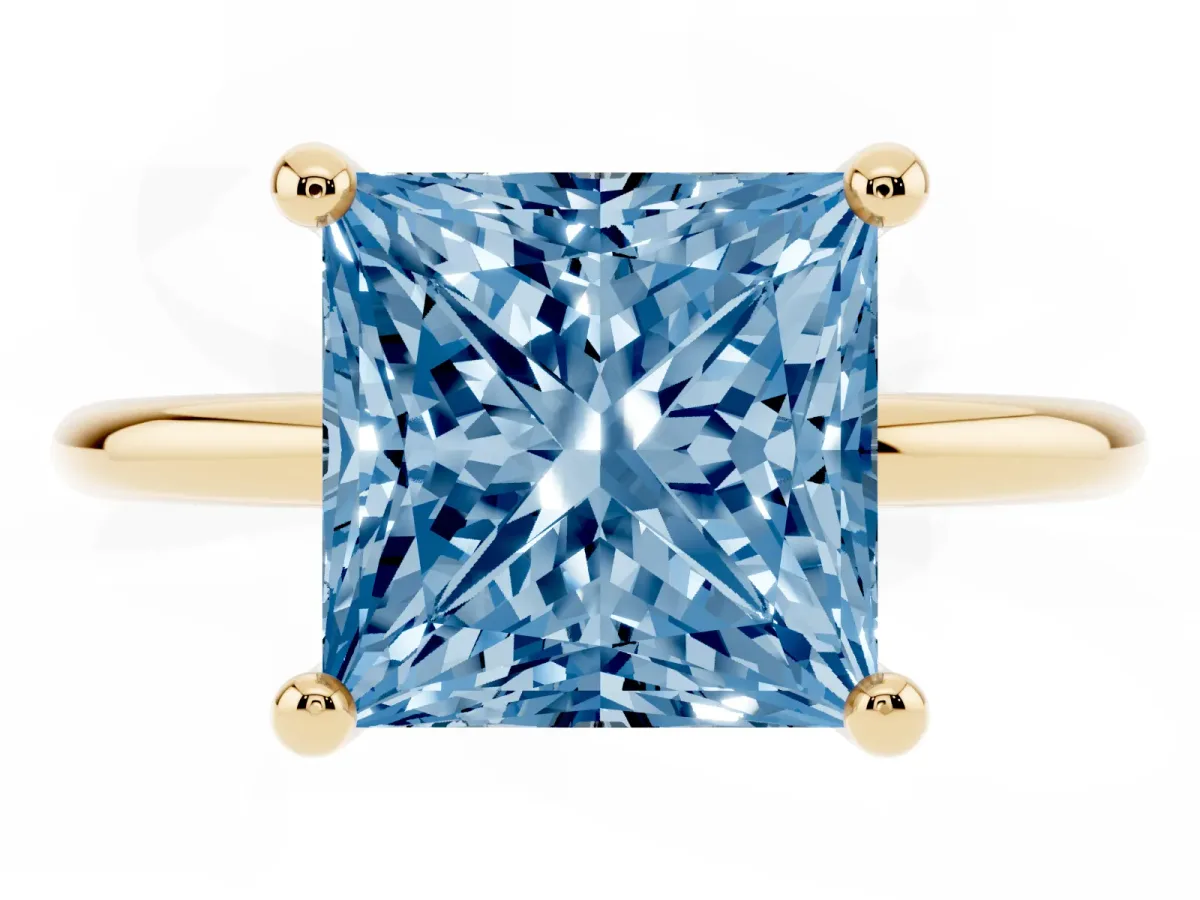 Fancy Blue Princess Cut Solitaire Diamond Ring with 4-Prong Setting on a Classic Band Yellow gold