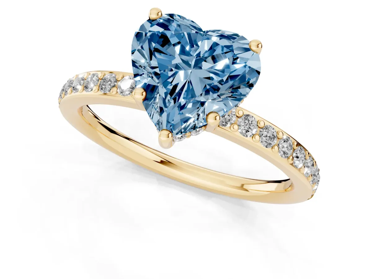 Fancy Blue Heart Cut Cut Diamond Pavé Band Ring with Four-Prong Setting Yellow gold