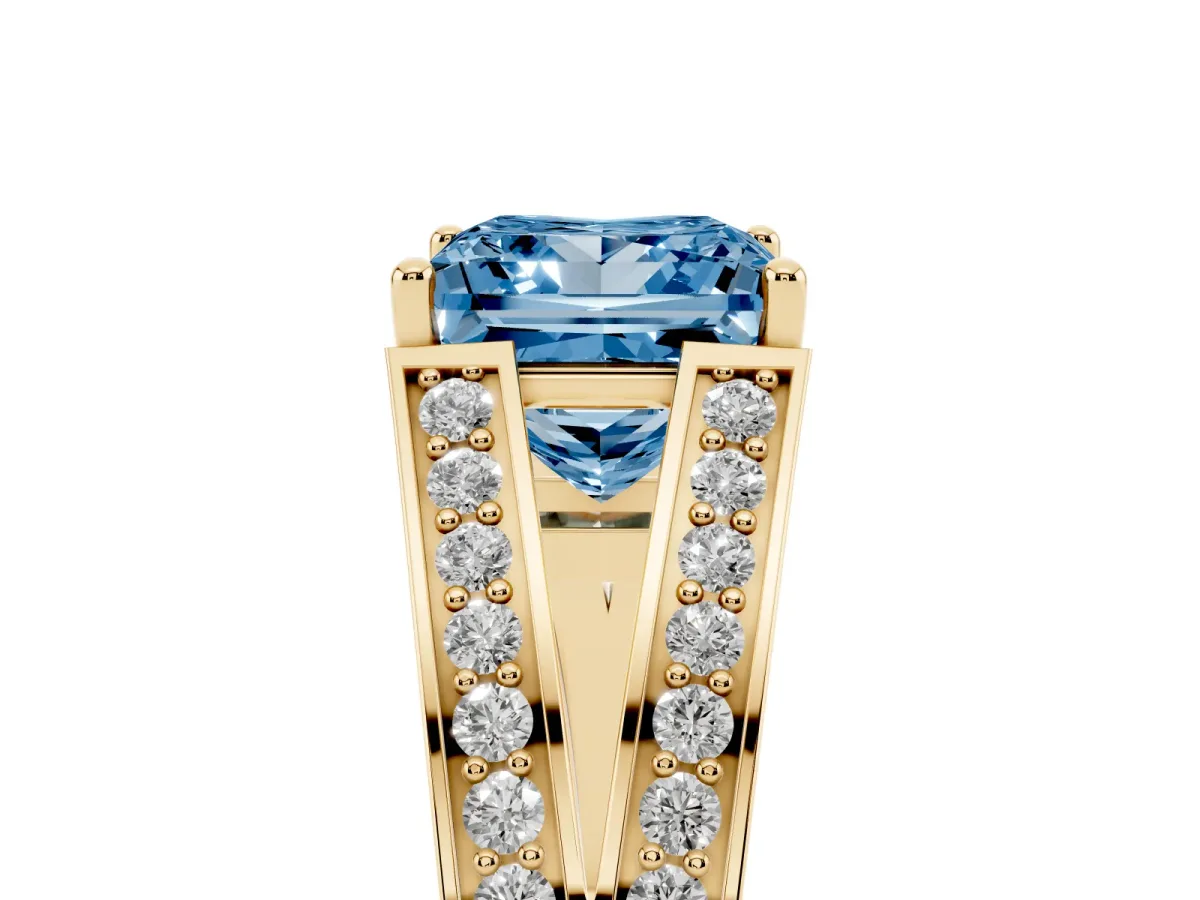 Fancy Blue Princess Cut Diamond Split Shank Ring with Pavé Band and Four-Prong Setting Yellow gold