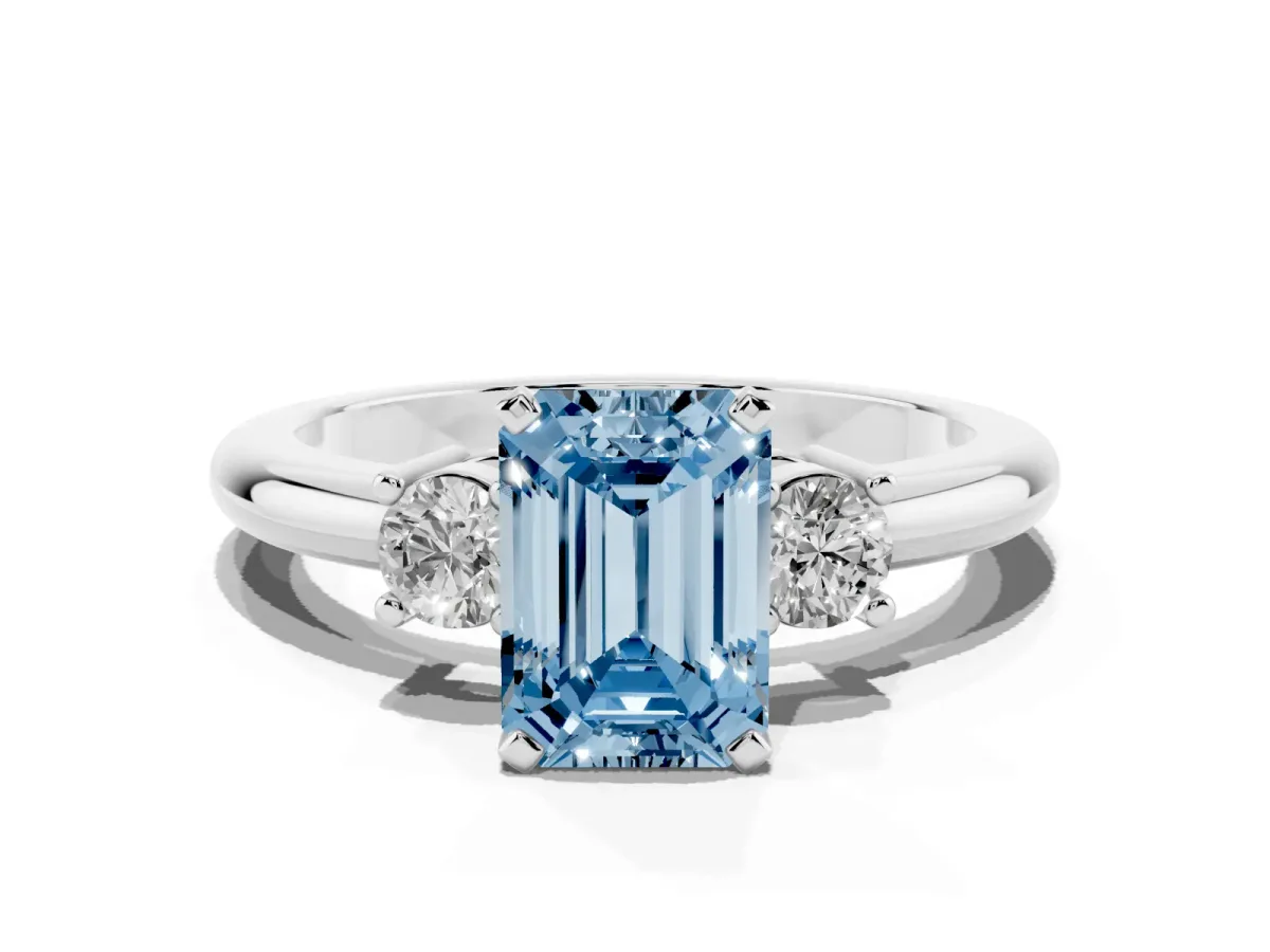 Fancy Blue Three-Stone Emerald Cut Cut Diamond Solitaire with Prong Setting and Classic Band Silver