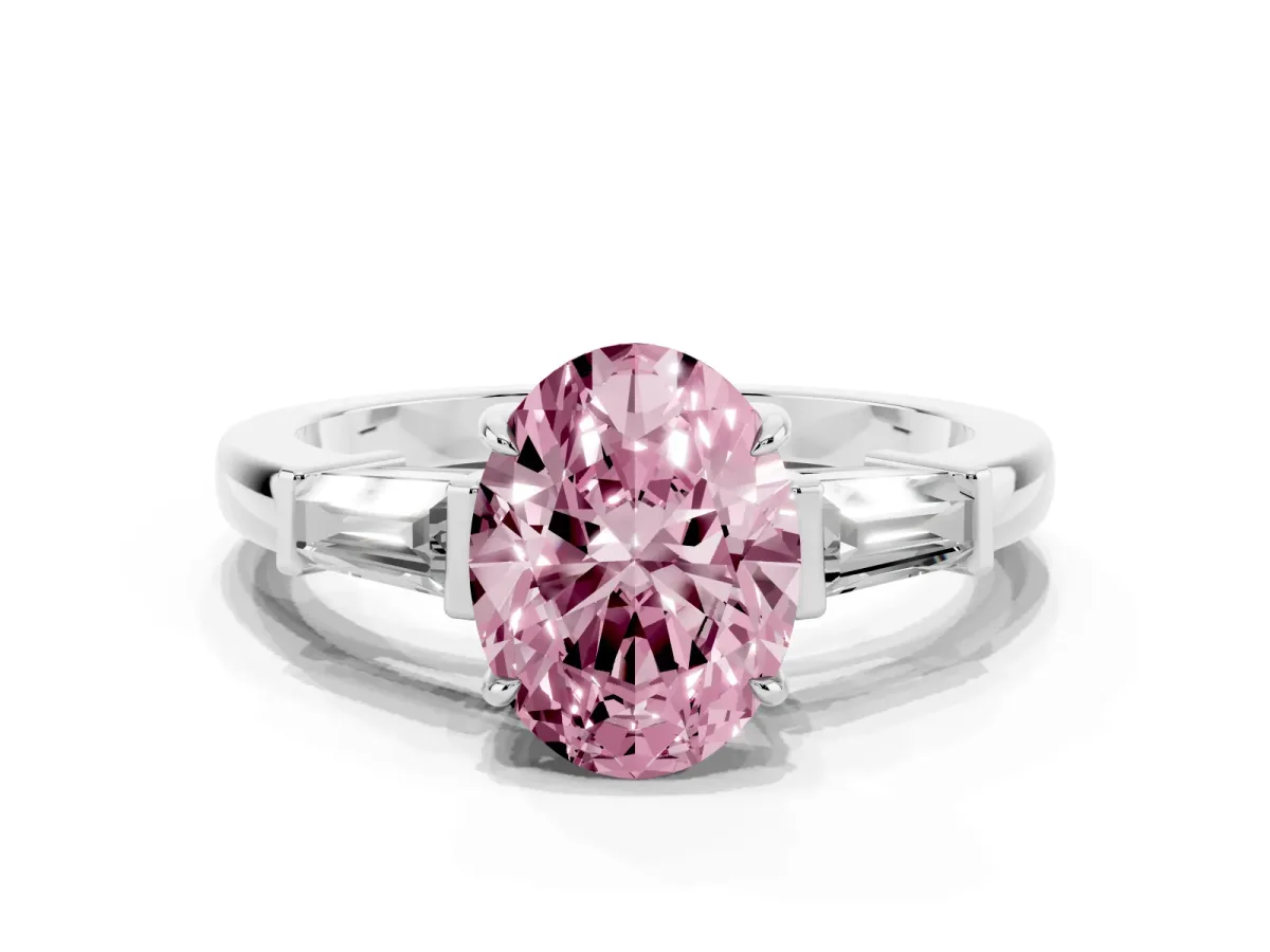 Fancy Pink Oval Cut Diamond Three-Stone Ring with Tapered Baguette Side Stones and Prong Setting Platinum