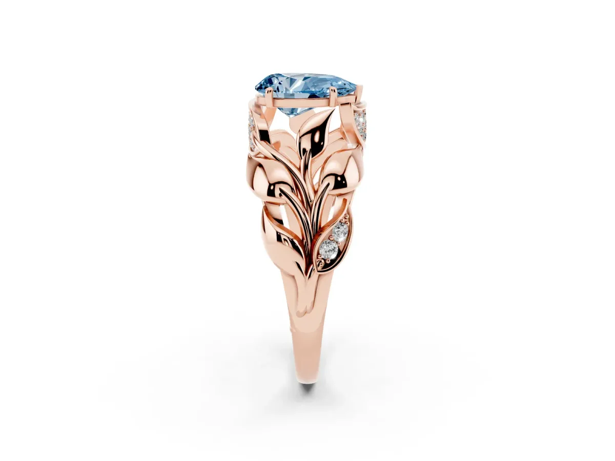 Fancy Blue Pear Cut Diamond Leaf-Inspired Engagement Ring with Round Accents and Prong Setting Rose gold