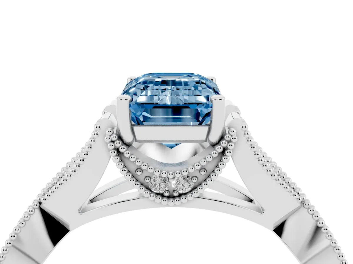 Fancy Blue Emerald Cut Cut Diamond Twisted Band with Milgrain Pave Setting and Four-Prong Setting Silver