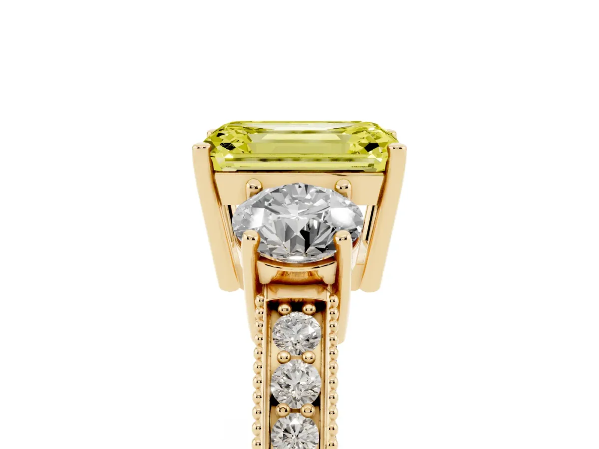 Fancy Yellow Emerald Cut Three-Stone Diamond Ring with Pavé Band and Four-Prong Setting Yellow gold