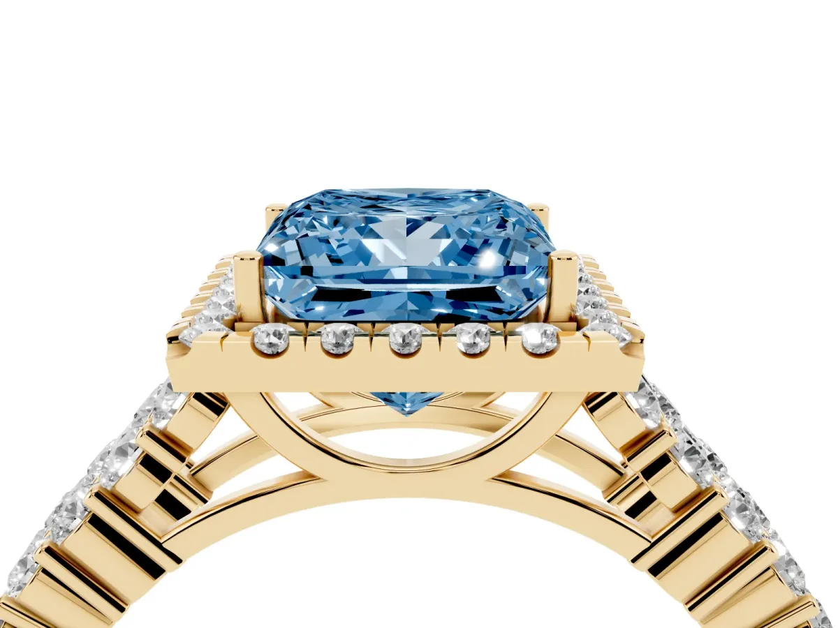 Fancy Blue Princess Cut Diamond Halo Engagement Ring with Triple Row Round Pavé Band and Prong Setting Yellow gold