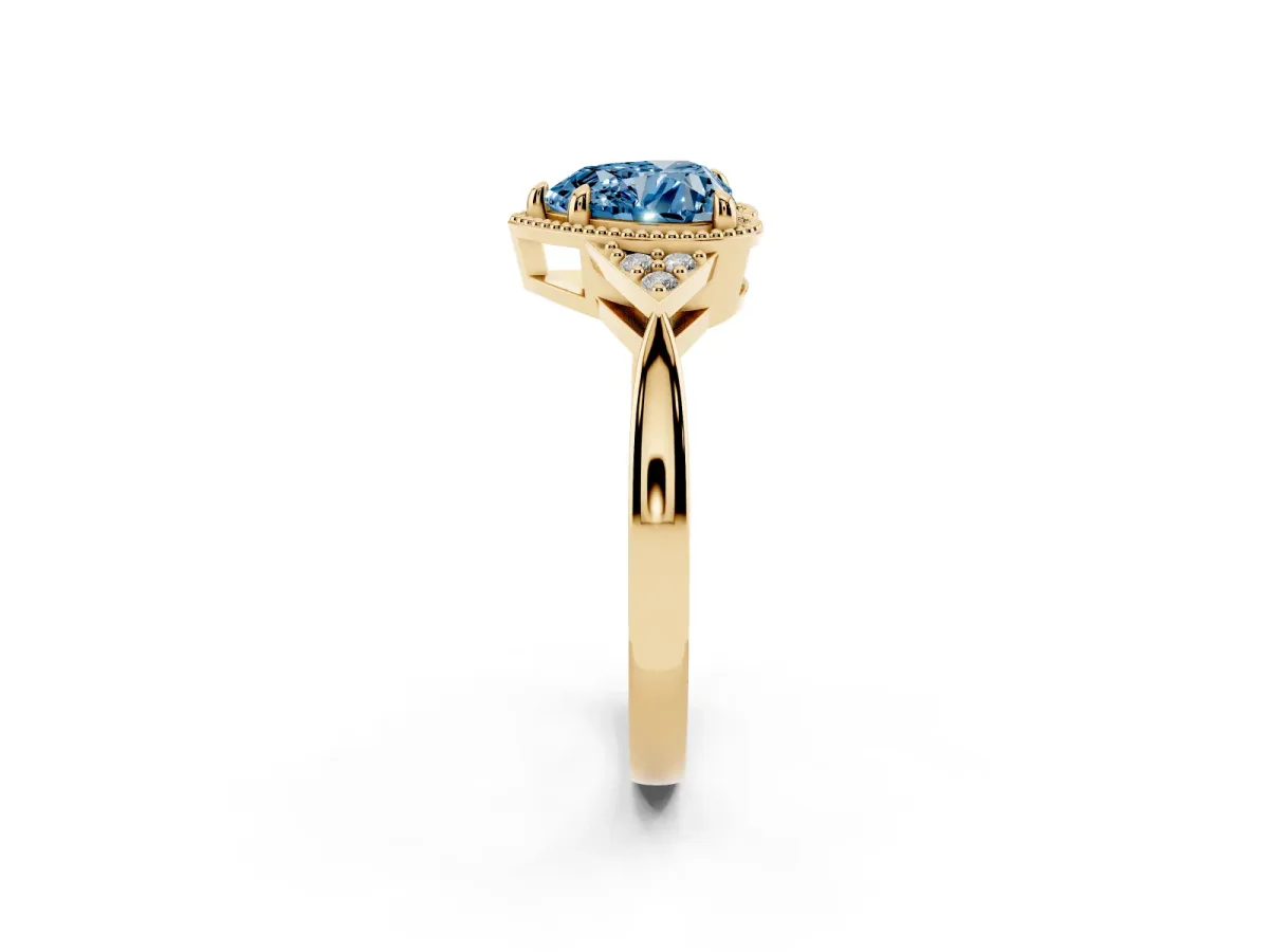 Fancy Blue Heart Cut Diamond Halo Ring with Tapered Band and Four-Prong Setting Yellow gold
