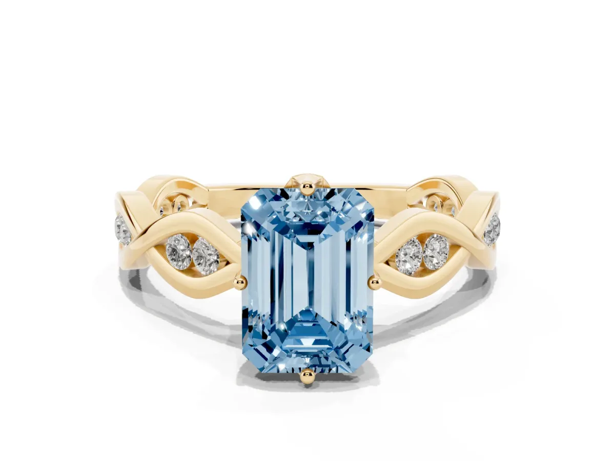 Fancy Blue Emerald Cut Solitaire Twist Band with Leaf Prong Setting Yellow gold