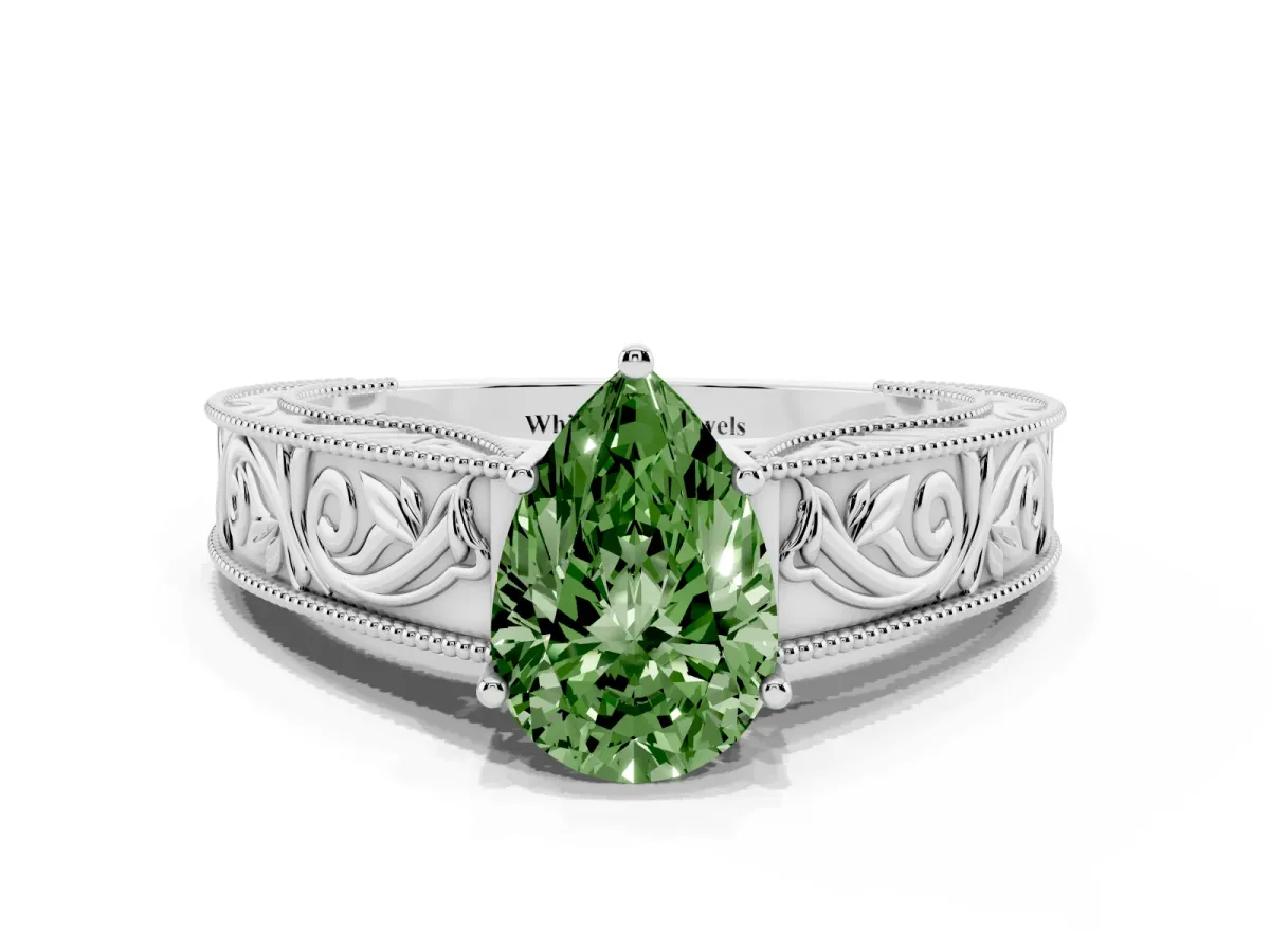 Fancy Green Pear Cut Diamond Solitaire Ring with Engraved Band and Four-Prong Setting Silver