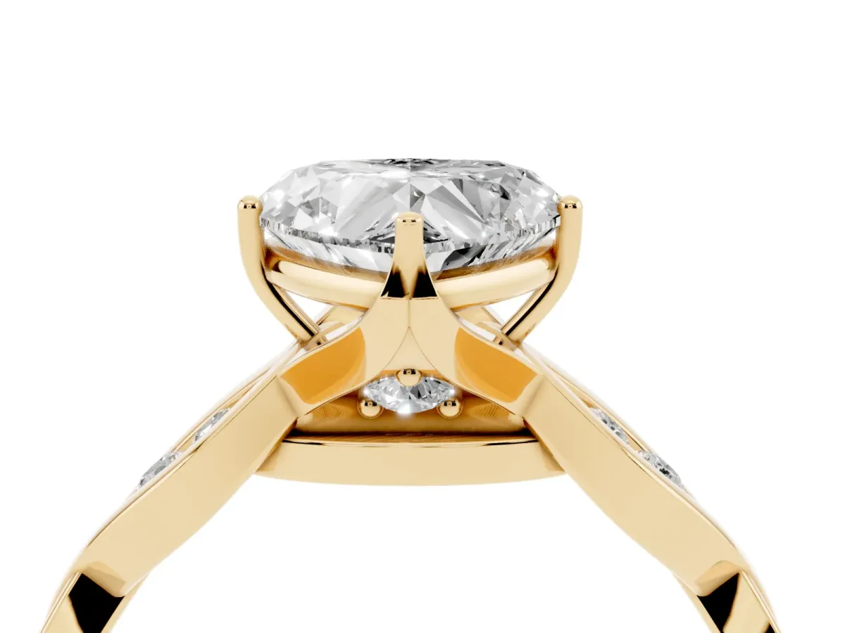Heart Cut Solitaire Twist Band with Leaf Prong Setting Yellow gold
